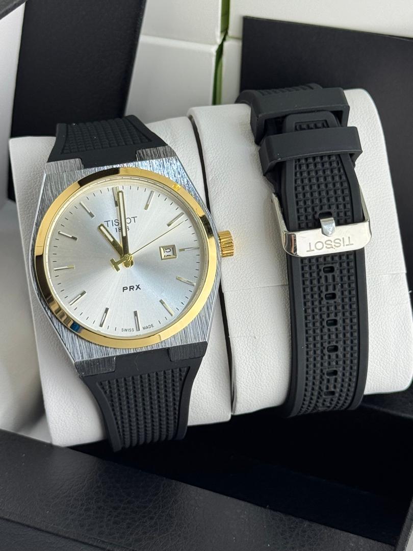 Tissot PRX Two-Tone Watch – Silver Dial with Gold Bezel & Black Rubber Strap